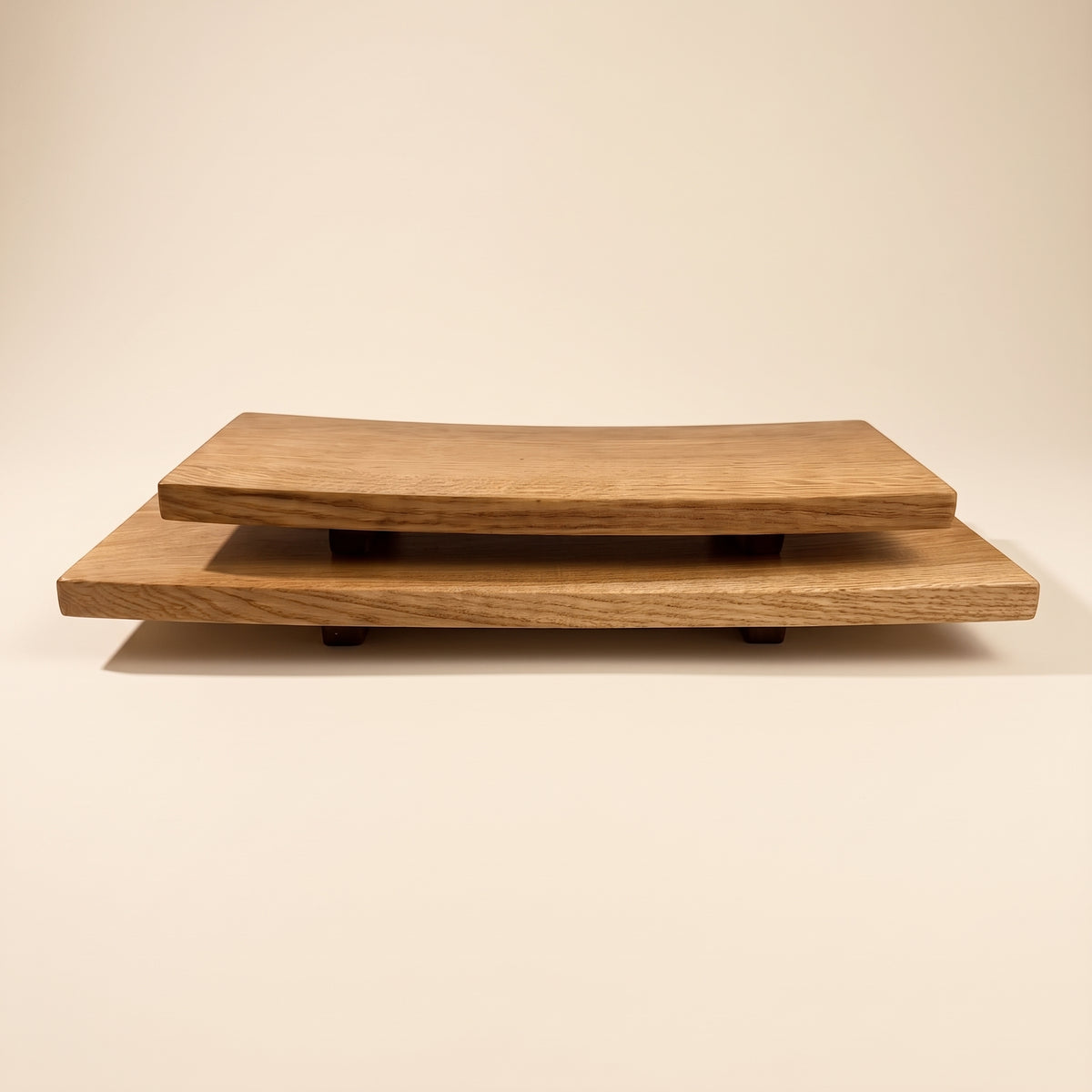 Two-tier wooden serving trays with a natural oak finish and live edges, shown on a plain beige background.