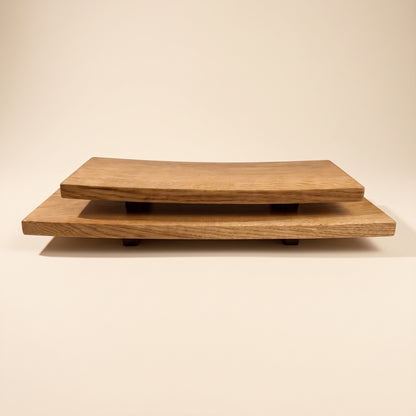 Two-tier wooden serving trays with a natural oak finish and live edges, shown on a plain beige background.