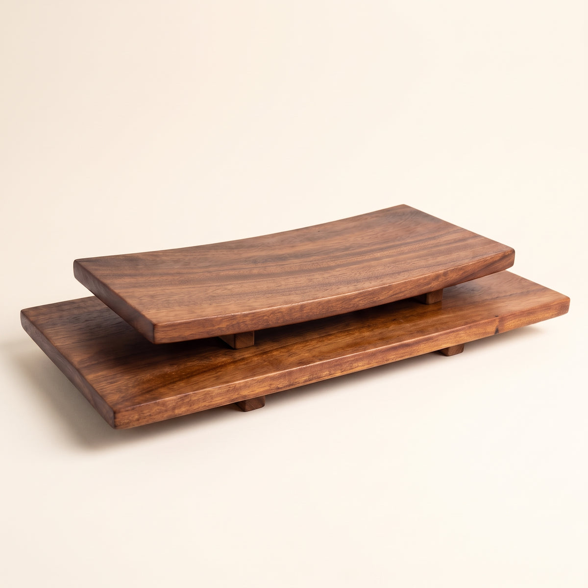 Fresh salmon nigiri and omakase sashimi served on a dark walnut wooden sushi tray