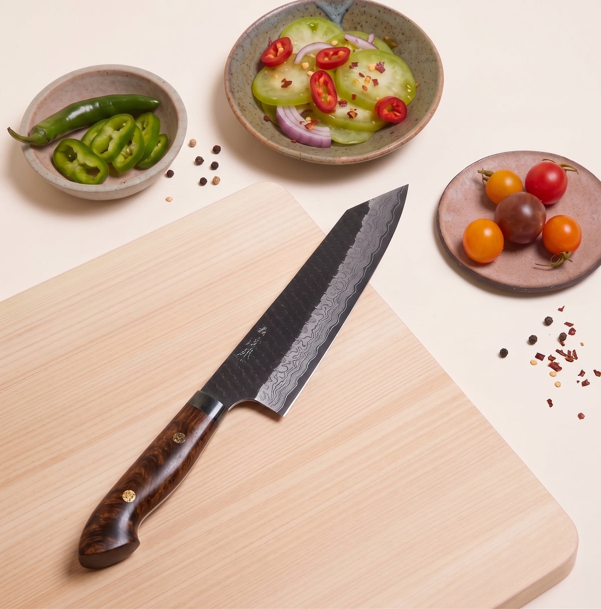 Nigara SG2 Kurouchi Tsuchime Kiritsuke Gyuto 210mm Japanese chef knife with desert ironwood handle next to cut vegetables 