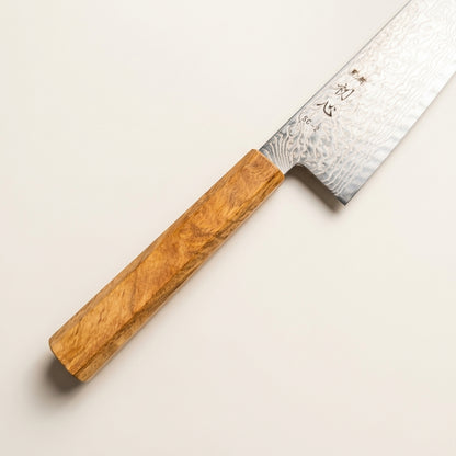 Octagonal Mediterranean olive wood wa-handle with rich golden grain figure on Hatsukokoro 180mm knife