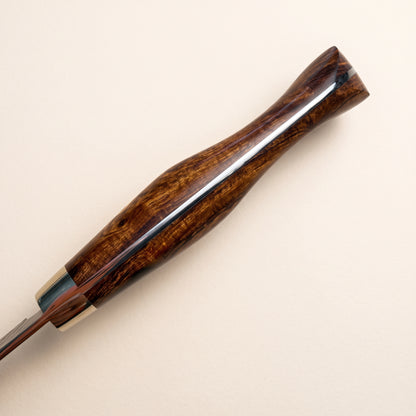 Detail view of dense desert ironwood grain and precise octagonal handle fit and sculpted finished on Nigara Kiritsuke