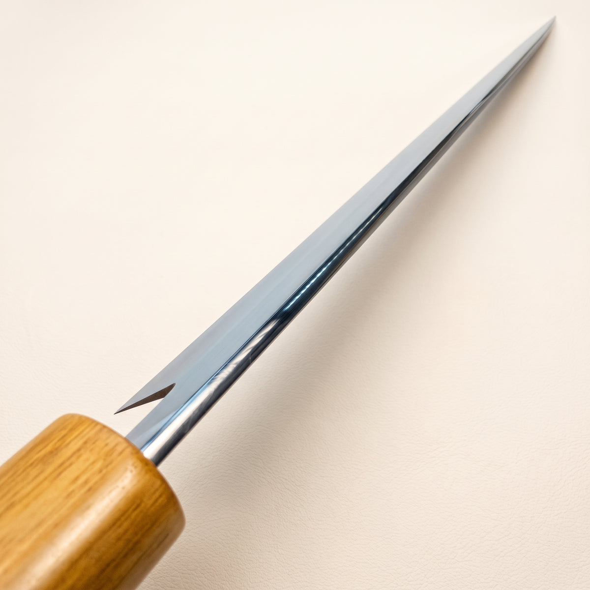 Masamoto KS3124 choil shot showing laser thin edge geometry with polished spine