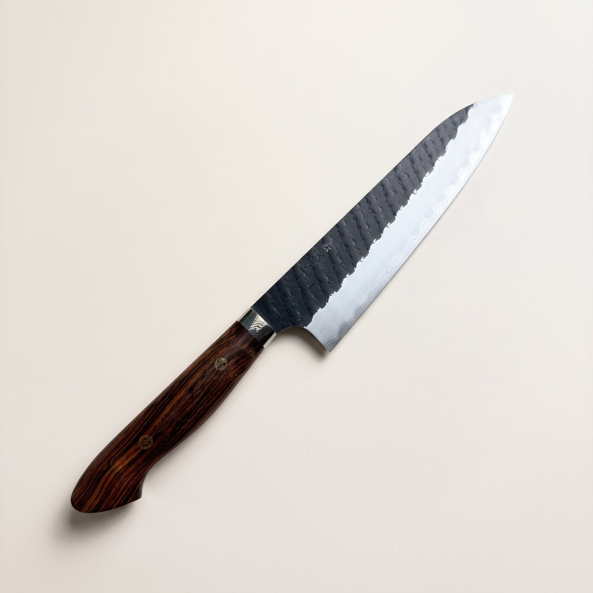 profile view showing 0px architectural edge finish, full-tang construction, and rich desert ironwood handle grain