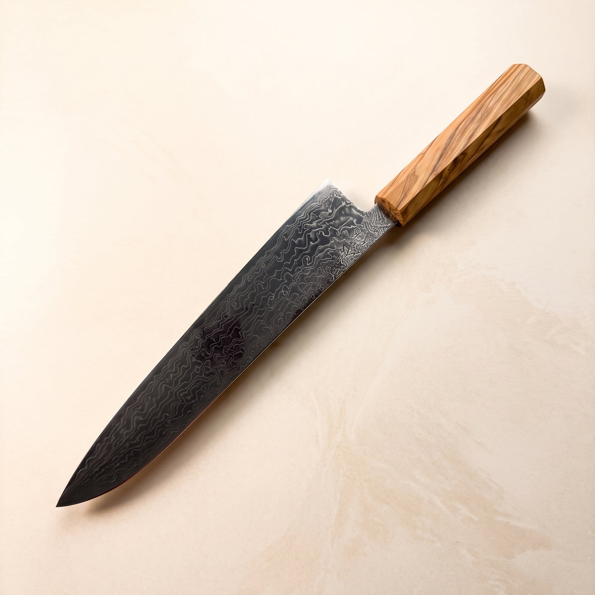 Hatsukokoro Ryuhyo 240mm Gyuto showing SG2 damascus steel migaki polished finish and octagonal olive wood wa-handle