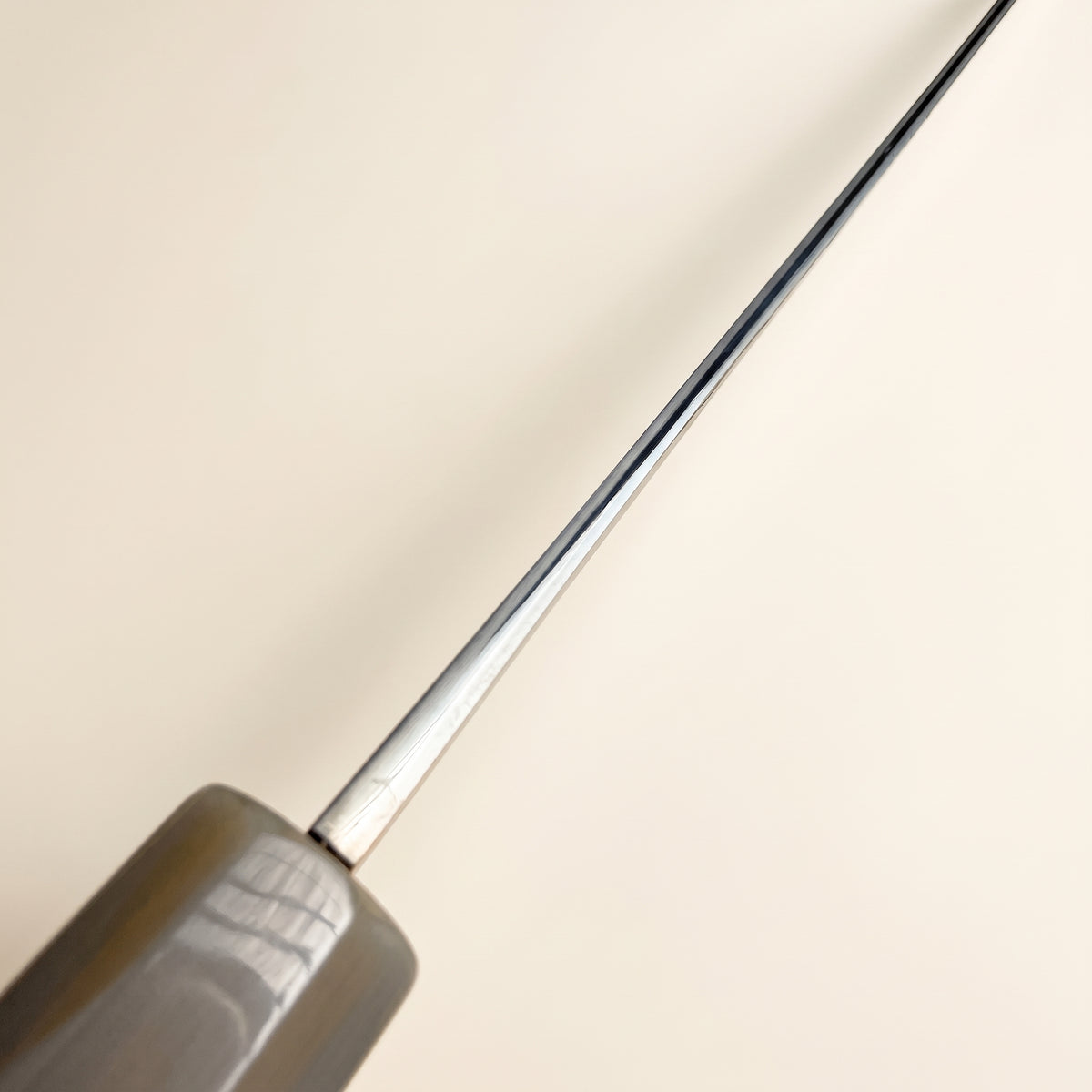 Top-down view of Japanese Kiritsuke spine joinery and hand-polished finishing detail